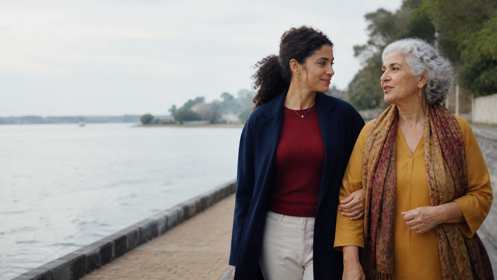 Two women review an important document together in natural light